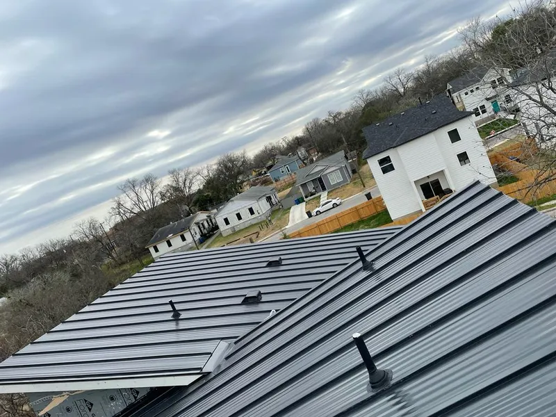 Standing seam metal roof panels with vents for Skylight Repair in Miles City